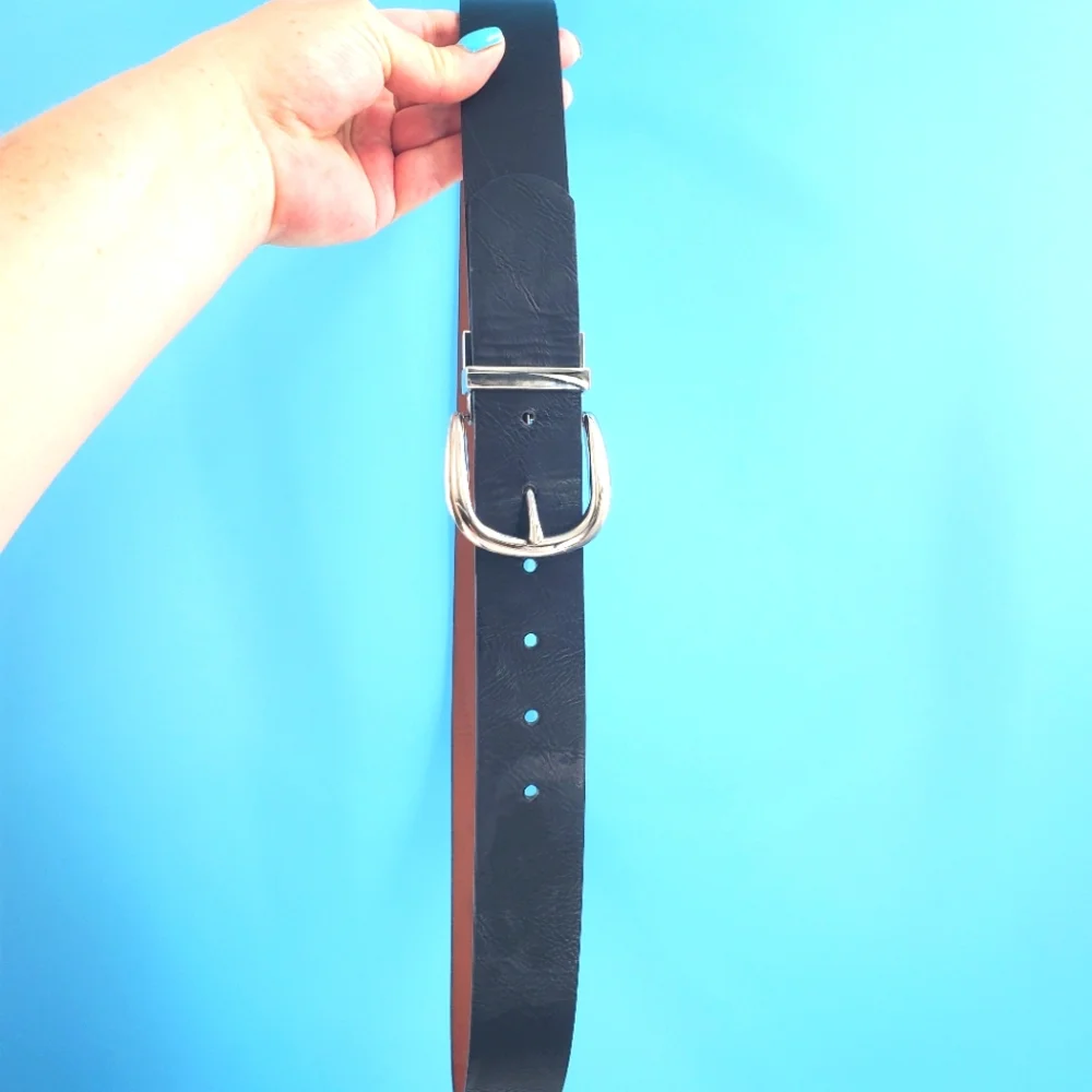 Black leather belt silver tone buckle
